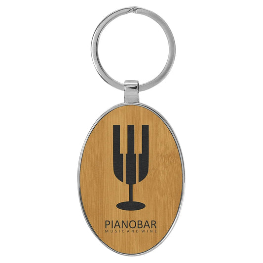 Bamboo 3" x 1 3/4" Laserable Leatherette/Metal Oval Keychain