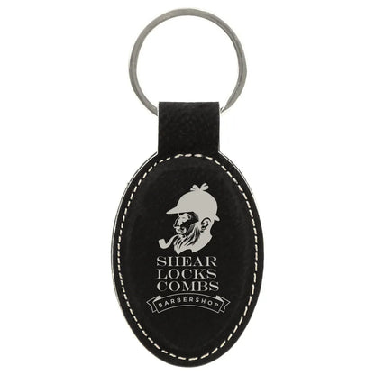 Black/Silver 3" x 1 3/4" Laserable Leatherette Oval Keychain