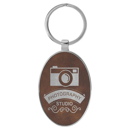 Rustic/Silver 3" x 1 3/4" Laserable Leatherette/Metal Oval Keychain