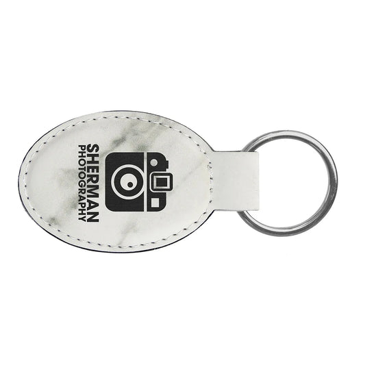 White Marble 3" x 1 3/4" Laserable Leatherette Oval Keychain