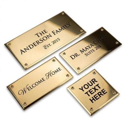 Four polished solid brass engraved nameplates arranged on white background