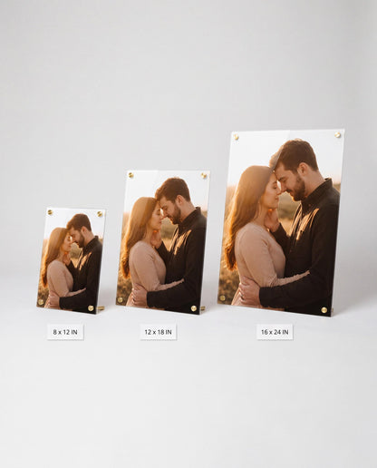 Three acrylic photo print sizes compared side by side 8x12 12x18 and 16x24 inches