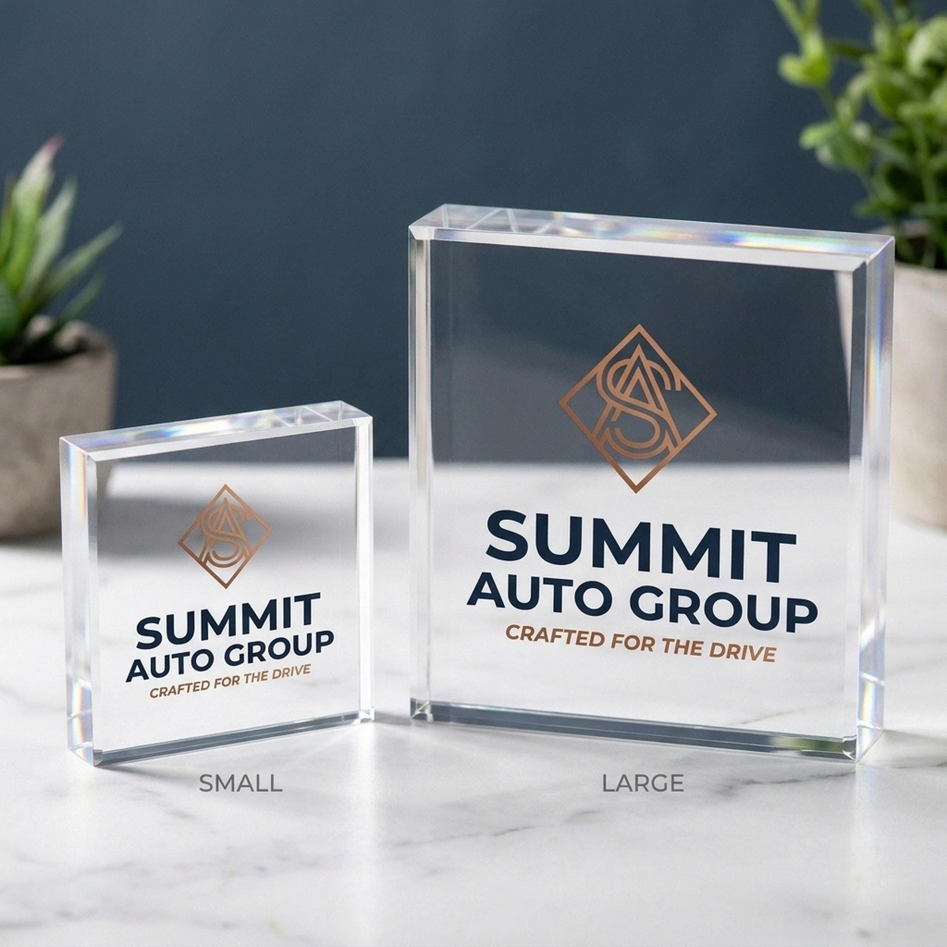 Two custom logo acrylic block sizes compared side by side, small and large