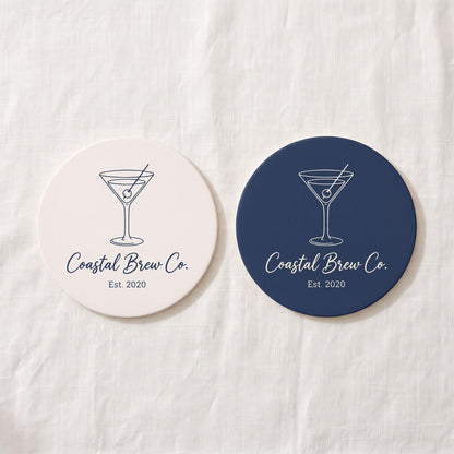 Two color options for the custom coaster: cream matte with navy print and navy blue with cream print.