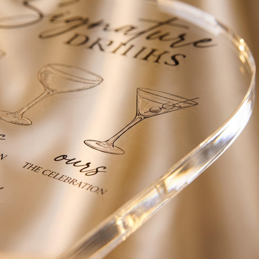 Close-up of the acrylic bar sign showing the illustrated cocktail glass and personalized drink label text.