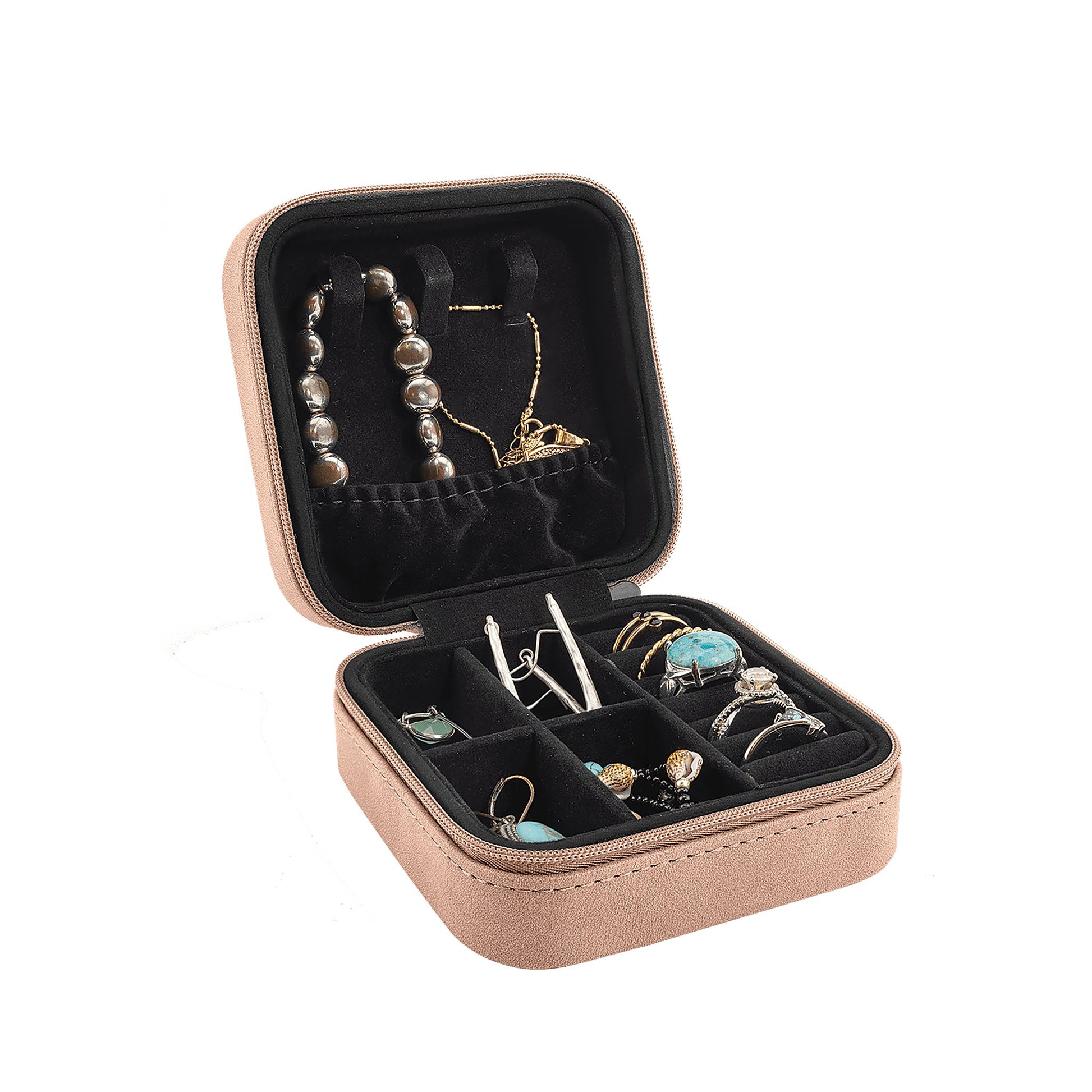 Travel jewelry box open showing rings, necklaces and earrings inside felt-lined compartments — Creekside blush leatherette, 4×4 inches